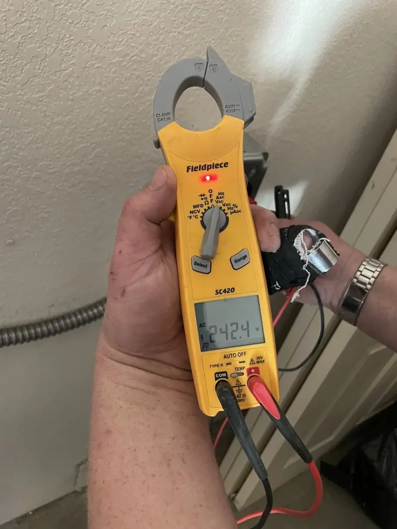 Voltage testing with clamp meter during Hot Tub / Pool Electrical Wiring in Hugo